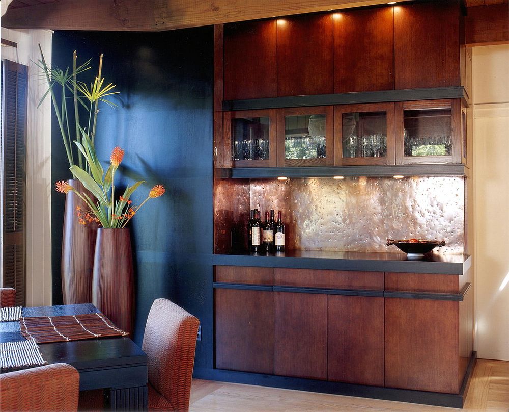 Hammered Copper Backsplash Adds Organic Texture Behind Bar