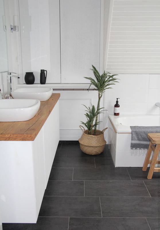 Woven Basket Planter Adds Organic Texture To A Modern Bathroom