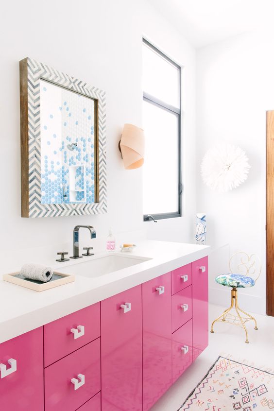 Pink Vanity With White Square Drawer Pulls Creates a Chic Look