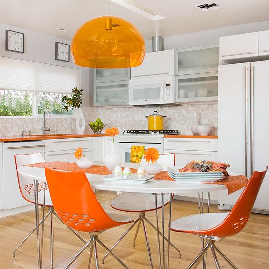 Orange Tulip Chairs Add Mid-Century Flair to Dining Area
