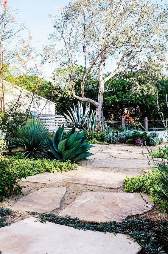 Irregular Stone Pavers Create Naturalistic Garden Paths
