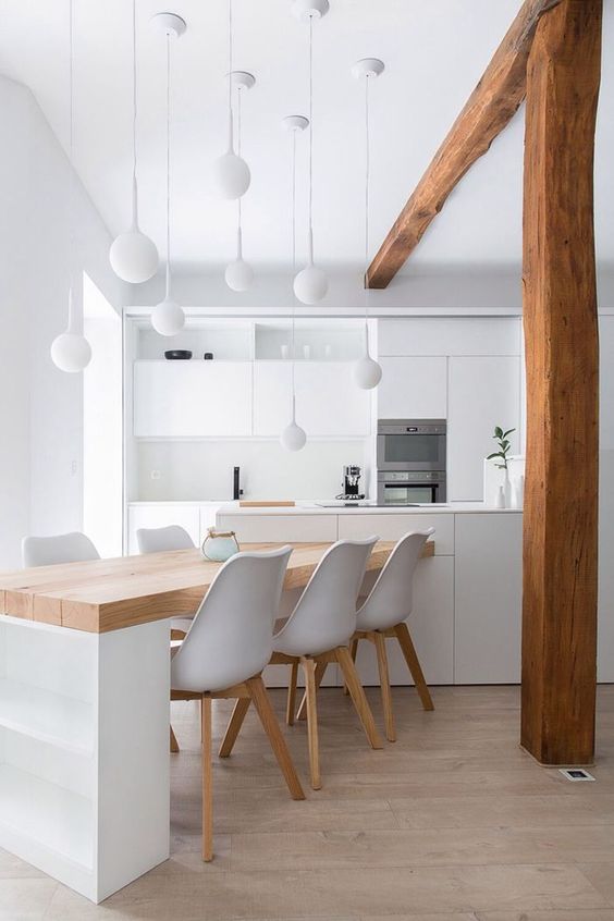 Cluster of White Pendant Lights Over Dining Area