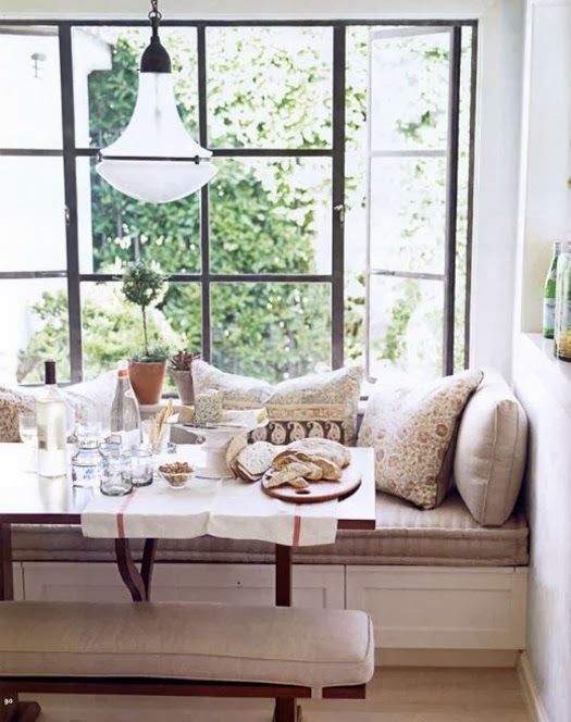Bench Seating With Built-In Cabinets Creates a Cozy Nook