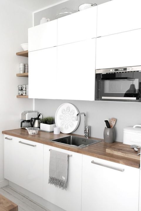 Break Up the Wall with a White Decorative Plate