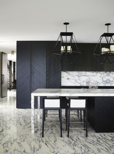 Geometric Black Lanterns Add Dramatic Lighting Over Island