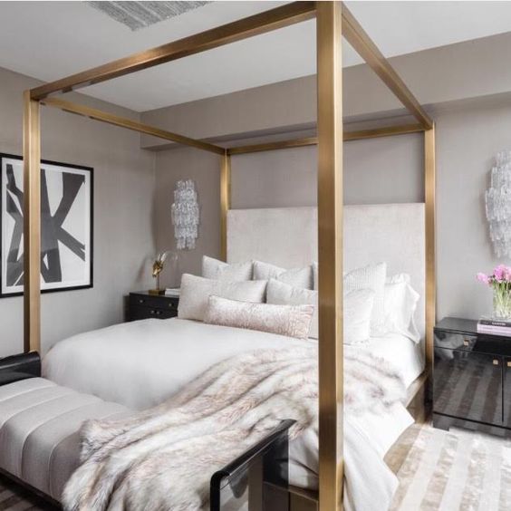 Brushed Gold Canopy Bed Frame With Plush Bedding