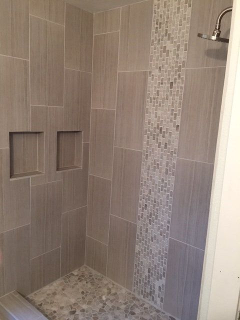 Recessed Niches Add Built-In Storage to Tall Shower Tiles