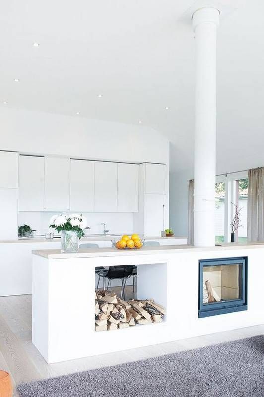 Built-in Fireplace and Wood Storage Add Cozy Charm