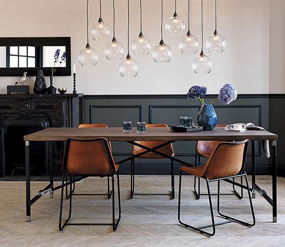 Clear Globe Pendants That Define Dining Space