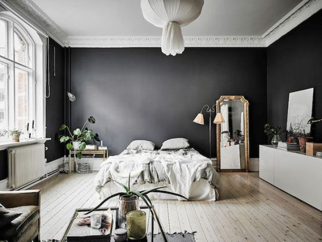Ornate Gold Mirror Reflects Light to Brighten Dark Walls