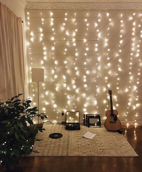 Wall of String Lights Creates a Cozy Music Corner
