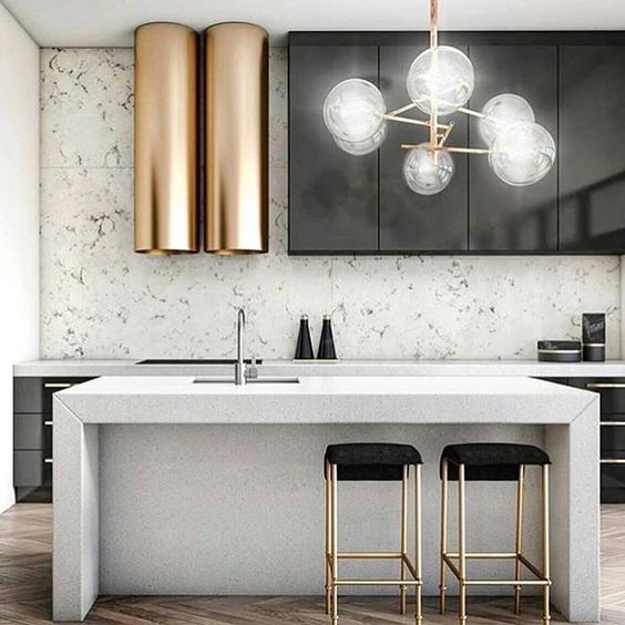 Double Cylindrical Hood Vents Add Metallic Shine