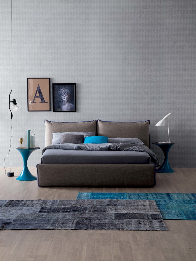 Blue Pedestal Tables Add Sculptural Accents Next to the Bed