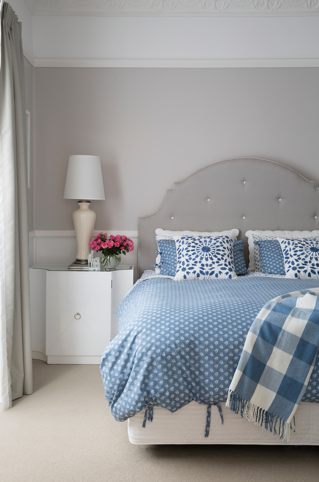 White Nightstand With Glass Top Adds Lightness Next to Bed