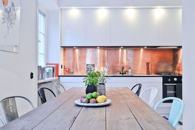 Large Copper Panel Backsplash Adds Warm Metallic Sheen