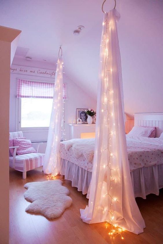 Drape Lights Down Sheer Fabric Pillars