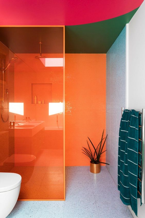 Orange Glass Shower Enclosure Creates a Bold Statement