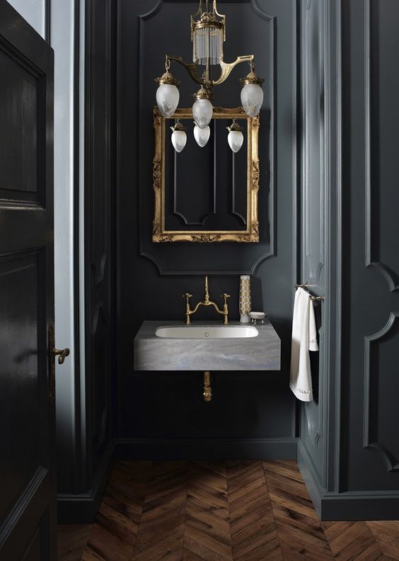 Ornate Gold Frame Creates a Dramatic Focal Point for Lighting