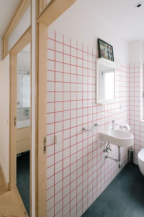 White Square Tiles With Red Grout Create a Bold Graphic Look