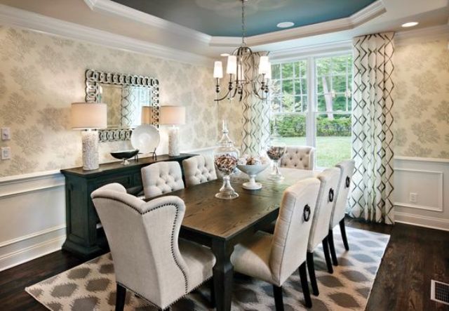 Tufted Dining Chairs With Ring Pulls Add a Polished Touch