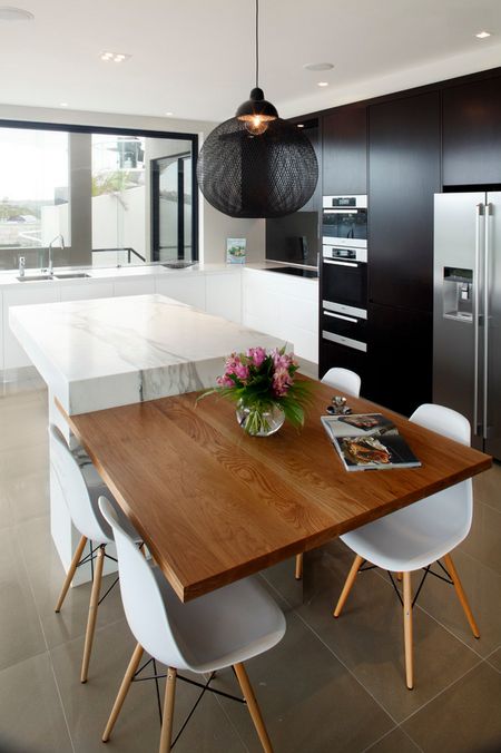 Extend Your Island With a Solid Wood Dining Table