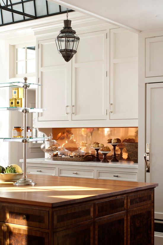 Smooth Copper Sheet Backsplash Adds a Gleaming Finish
