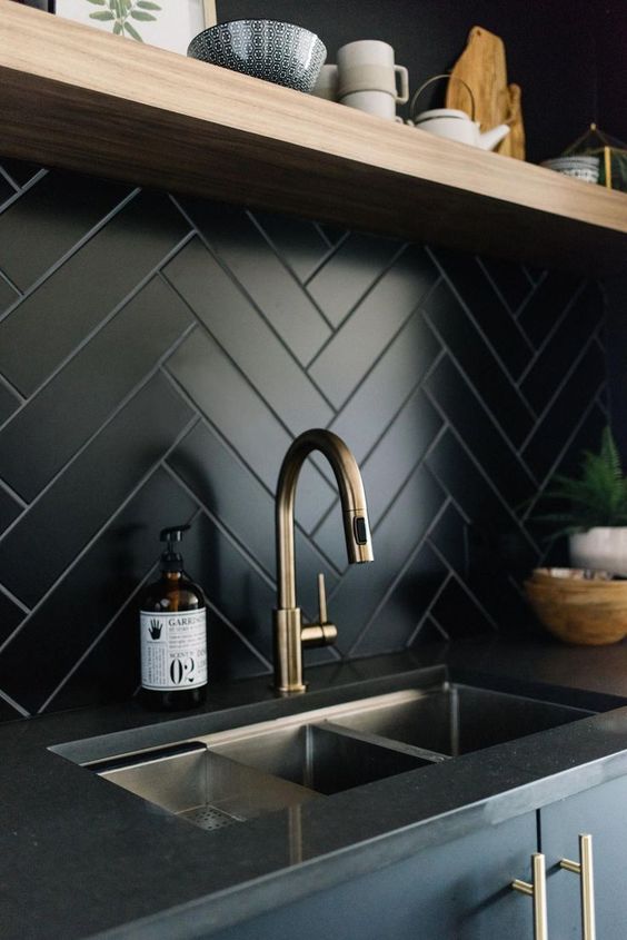 Matte Black Herringbone Tile Backsplash Adds Dramatic Depth