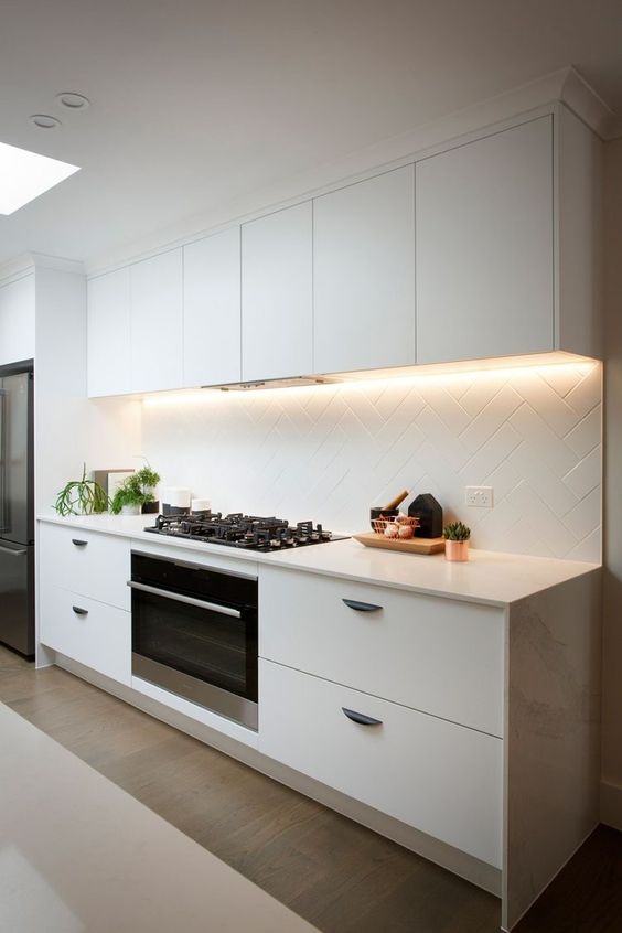 Herringbone Tile Backsplash Adds Subtle Pattern