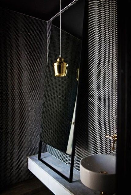 Brass Pendant Light Adds Warmth to Dark Penny Tile Bathroom