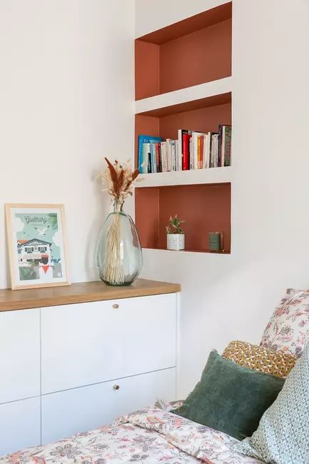 Terra Cotta Backed Niches Add Warmth to White Walls