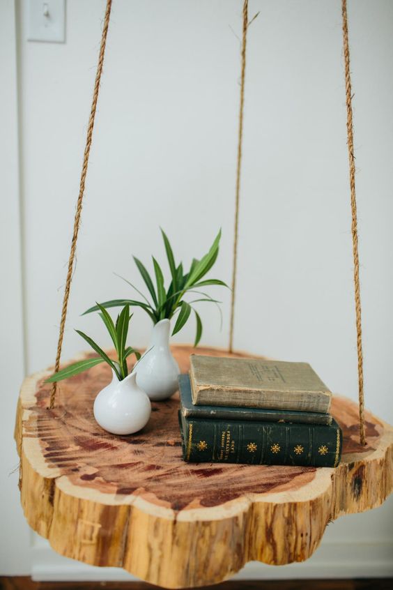 Hanging Wood Slice Shelf With Two White Bud Vases