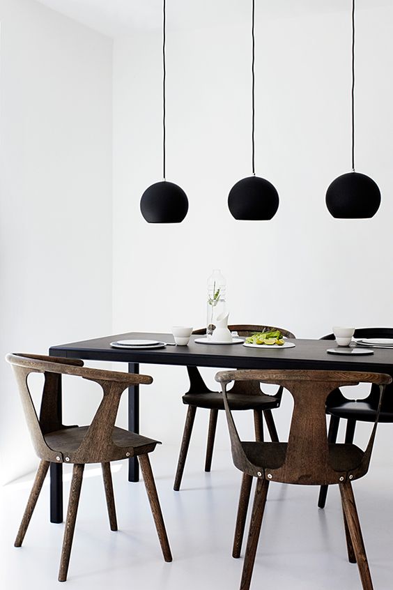 Matte Black Spheres Create a Modern Pendant Grouping