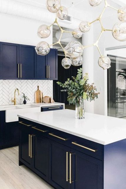 Tall Glass Vase Adds Organic Shape to Kitchen Island