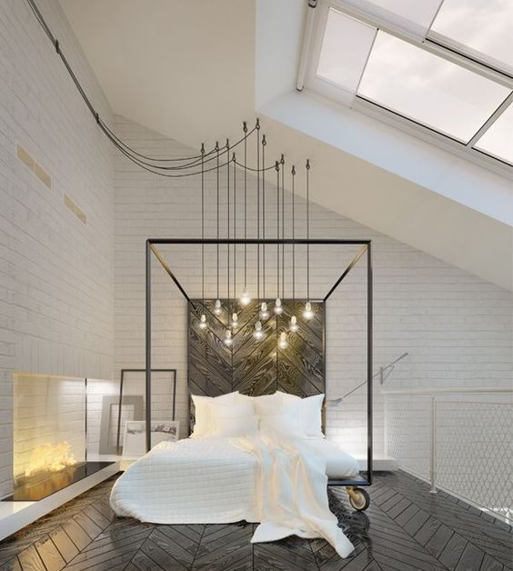 Cluster of Bare Bulbs Illuminates Canopy Bed