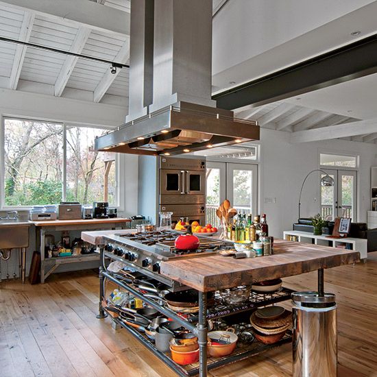 Prep with a Butcher Block Island Featuring Open Metal Shelving