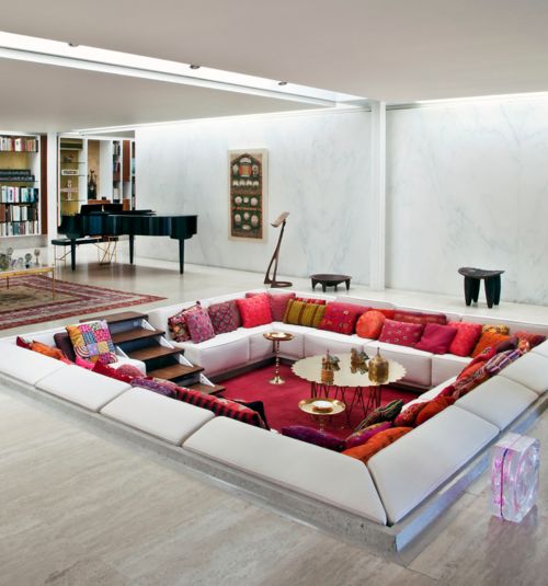 Layered Floor Cushions Add Boho Texture to White Sectional
