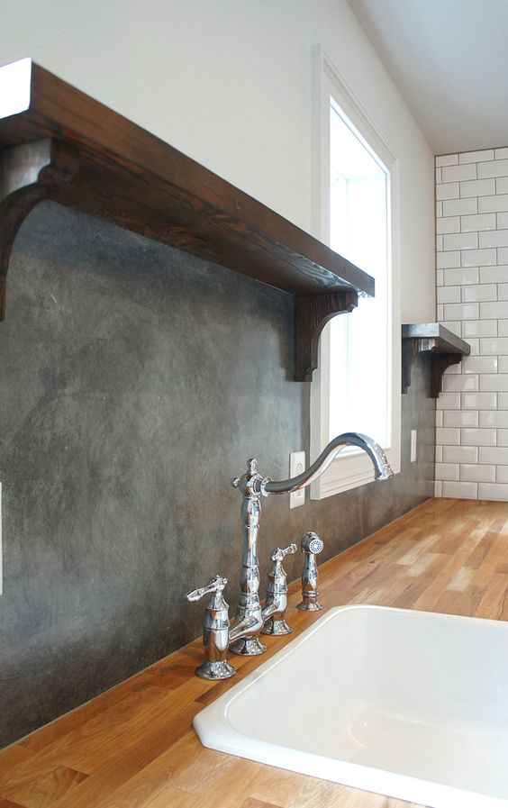 Combine Rustic and Modern with Dark Wood Shelves and Grey Backsplash