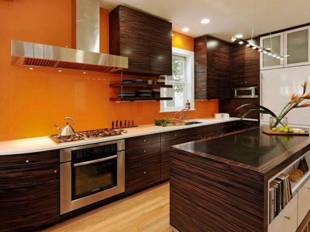 Orange Glass Backsplash Offers a Smooth Surface For Easy Cleaning