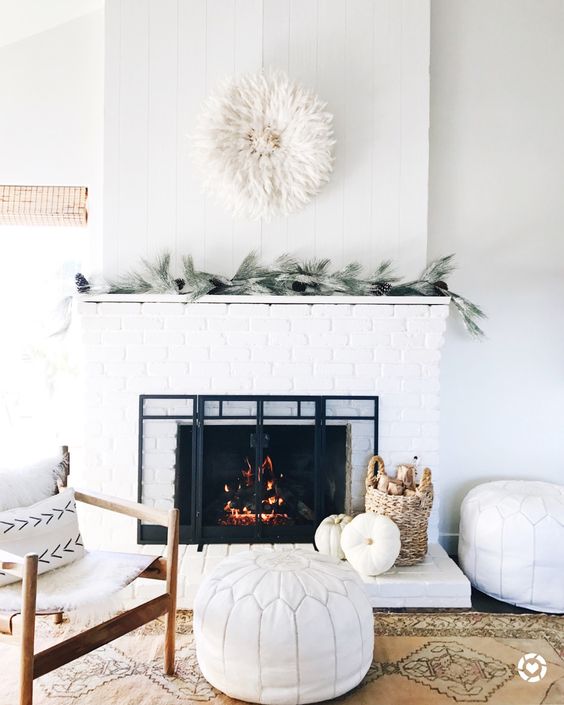 Fluffy White Wall Decor Adds Soft Texture Above the Mantel