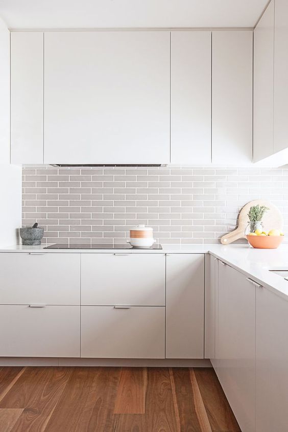 Soften White Cabinetry with a Subtle Grey Subway Tile Backsplash