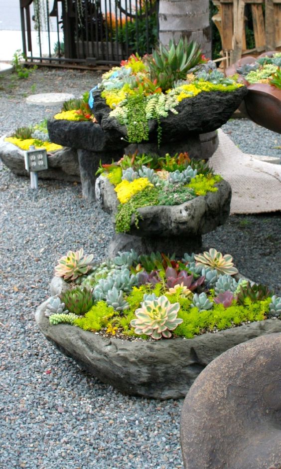 Stacked Stone Planters Create Multi-Level Displays