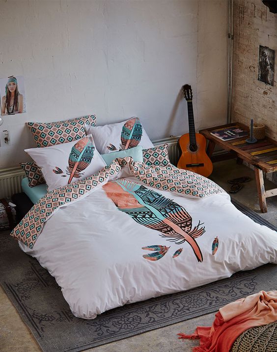 White Duvet with Oversized Feather Graphic Adds a Bold Statement