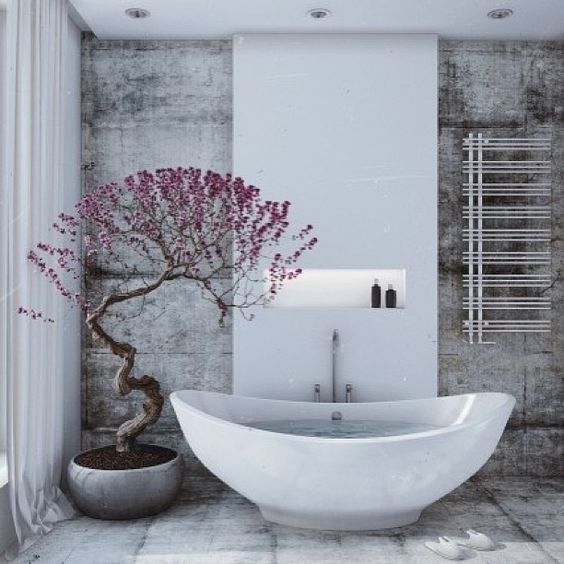 Twisted Bonsai Tree Adds Sculptural Interest Next to the Tub