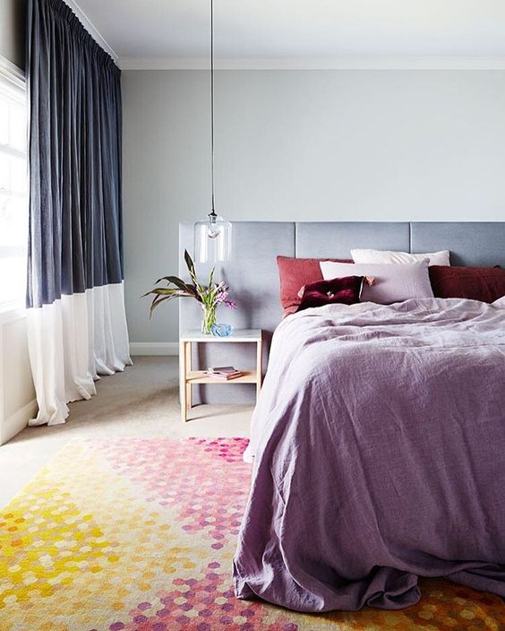 Ombre Hexagon Rug Blends Yellow, Pink, and Purple Tones