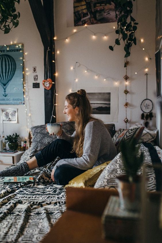 String Lights Draped With Hanging Plants Create a Boho Vibe