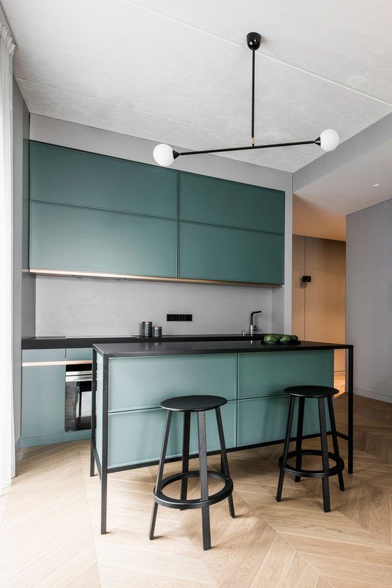 Matte Teal Cabinets with Thin Black Frame Detail