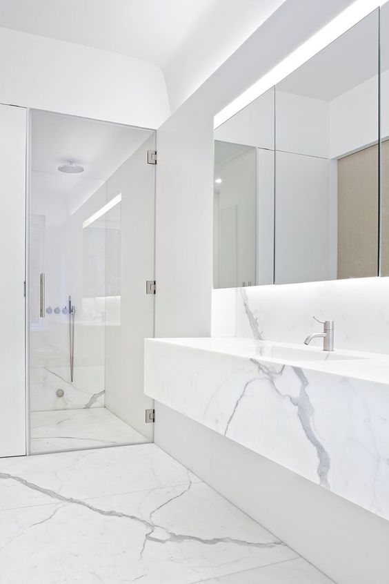 Marble-Look Tile Continues Floor to Shower