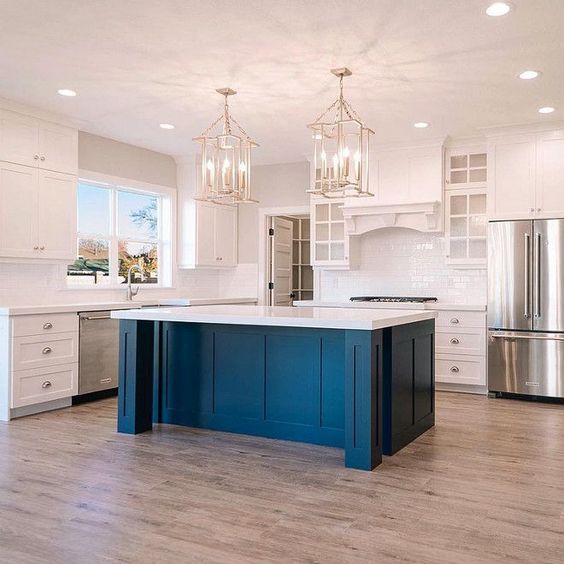 Bold Blue Island With Paneled Sides Anchors Kitchen