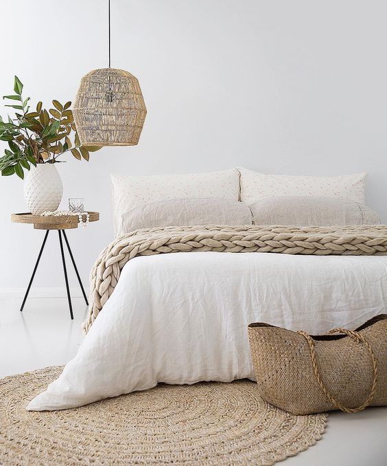 Woven Pendant Adds Natural Texture Above Bed