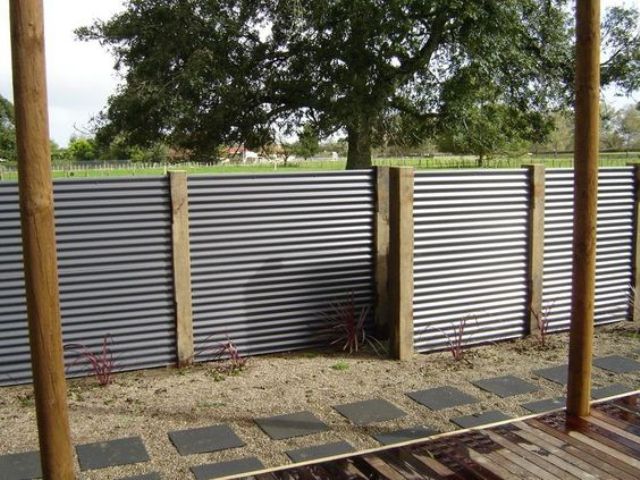 Pair Corrugated Metal with Rough Wood Posts for Contrast